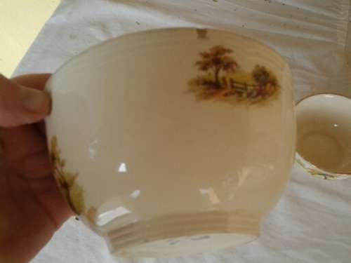 a set of three vintage hayride pattern porcealin sugar bowls