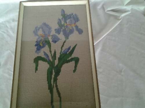 framed pretty purple flower tapestry behind glass