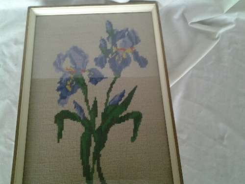framed pretty purple flower tapestry behind glass