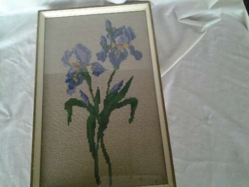framed pretty purple flower tapestry behind glass