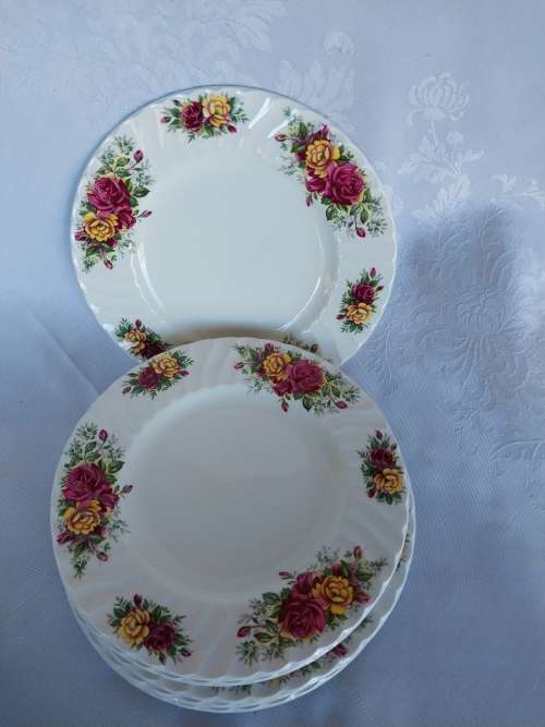 A set of six Ashley procelain side plates