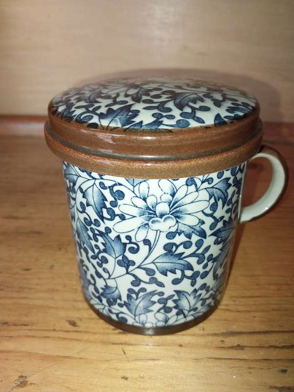 Blue and white oriental mug