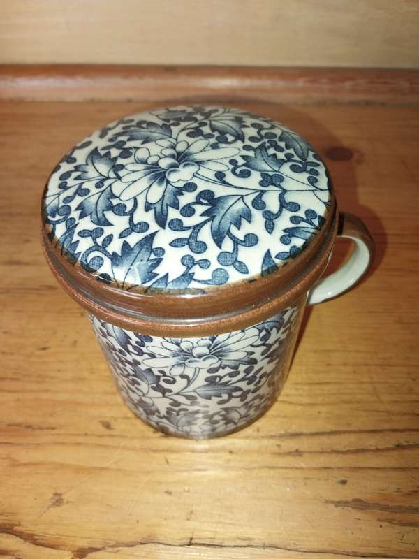 Blue and white oriental mug