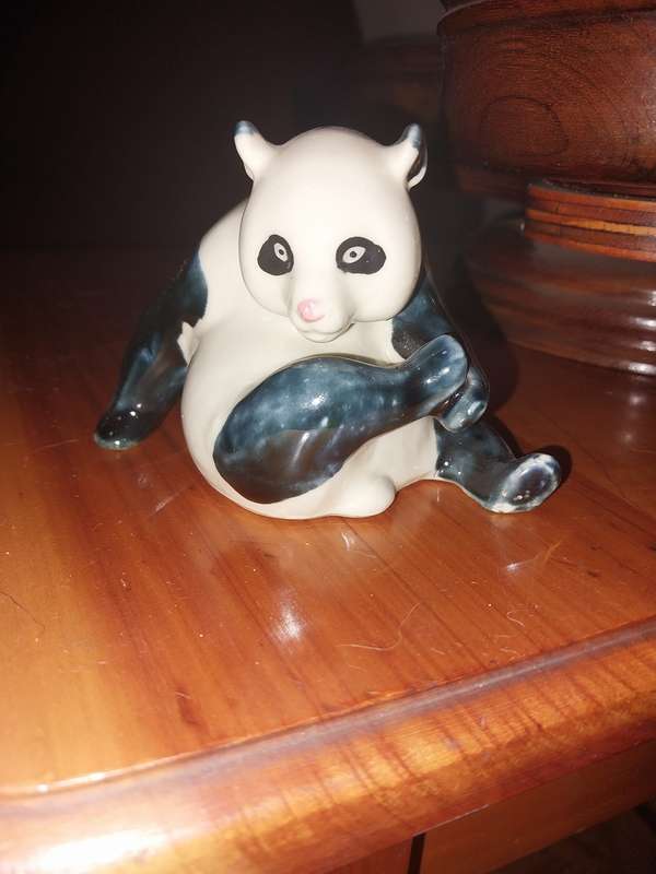 To cute small oriental bear oramnent