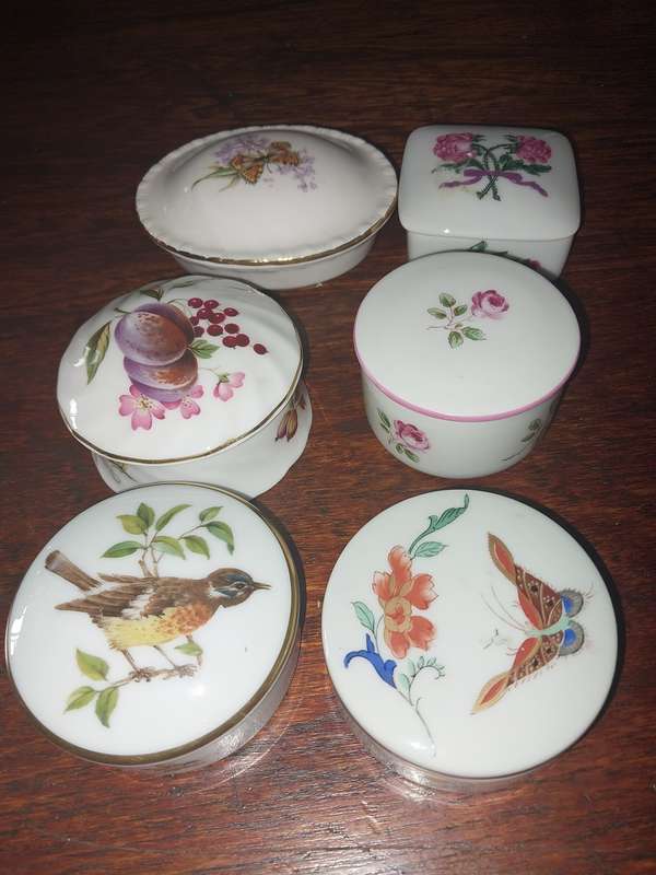 Six assorted small procelain trinket boxes