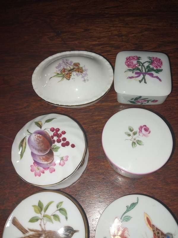 Six assorted small procelain trinket boxes