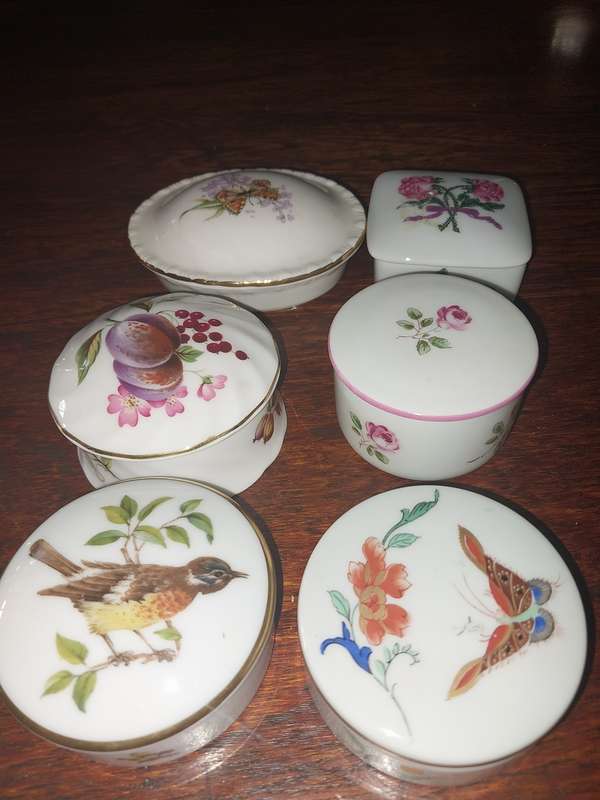 Six assorted small procelain trinket boxes