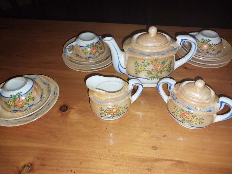 Collectable part procelain doll set