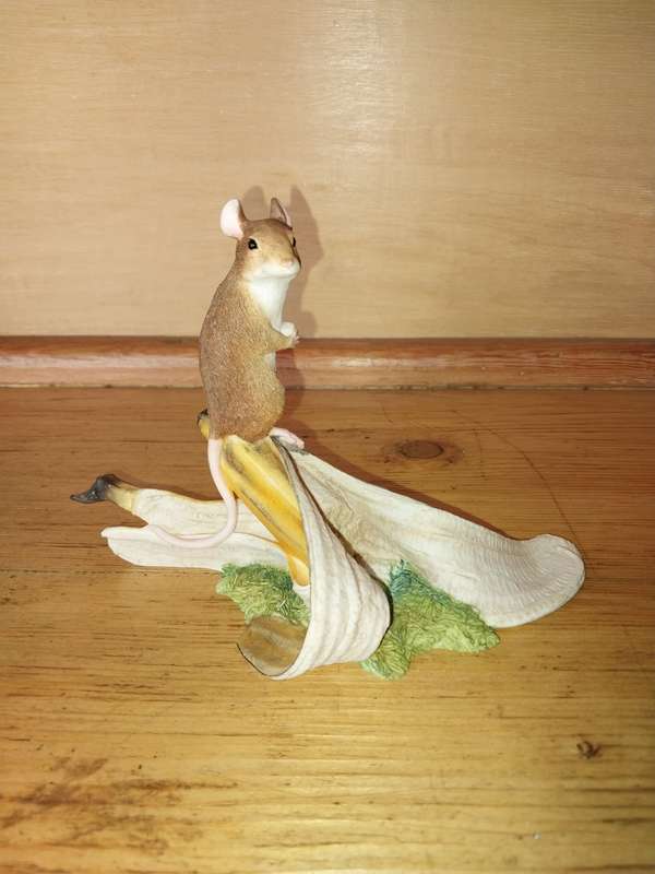 Cute mouse on a banana ornament