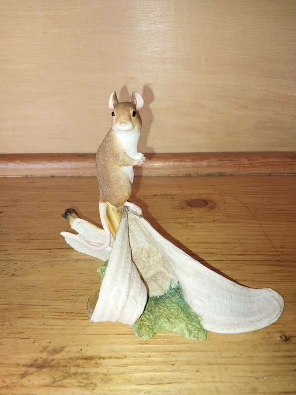Cute mouse on a banana ornament