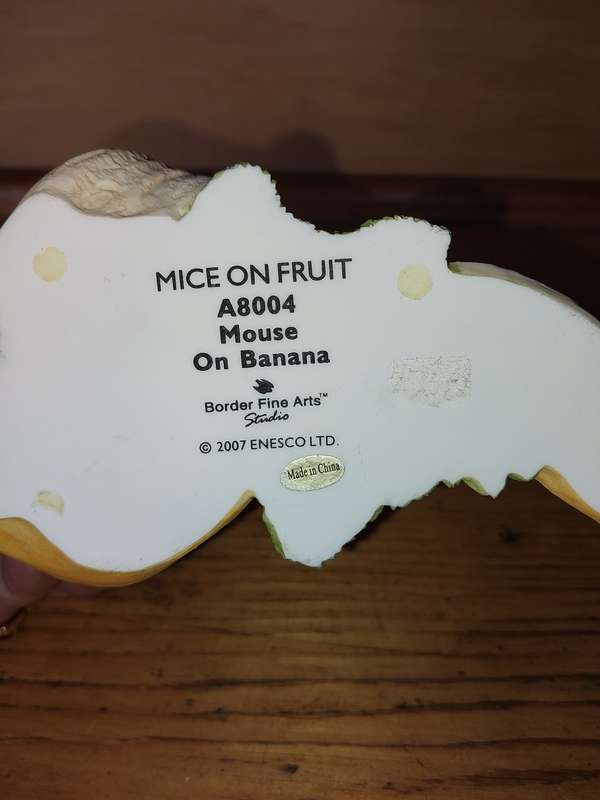 Cute mouse on a banana ornament