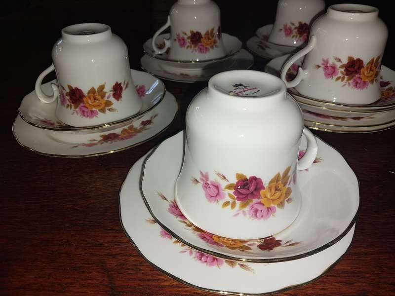 A set of five queen Anne tea cup trios