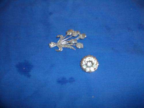 set of two sliver plated brooches with white stones and marquisette