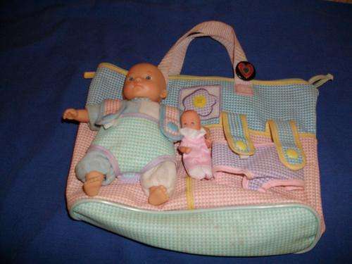 dolls on a kiddies hand bag (baby angel small and tinny)