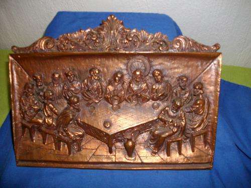 A religious copper hanging of Jesus and the last supper