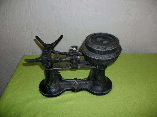 Metal scale with two weights,