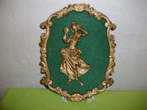 Made in italy , gold plated frame with lady figurine on it