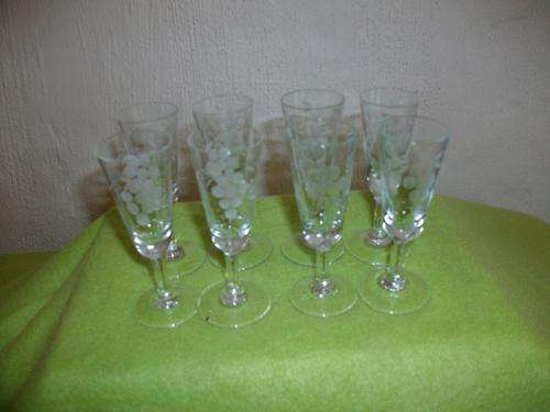 Set of eight grape vine pattern tot glasses
