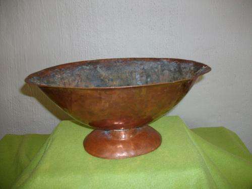 A sold copper vase