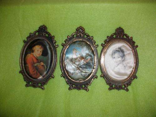 set of three small silk pictures and metal frames