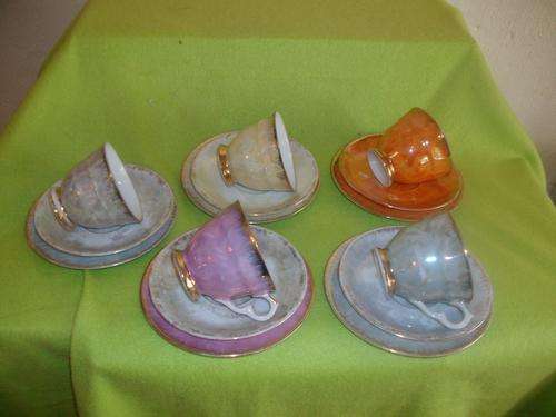 set of five mother of pearl trio's tea cups