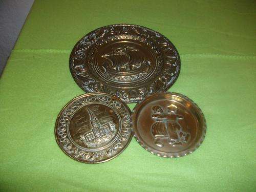 Collection of three small brass wall plates