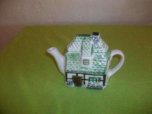 Lovely houses tea pot
