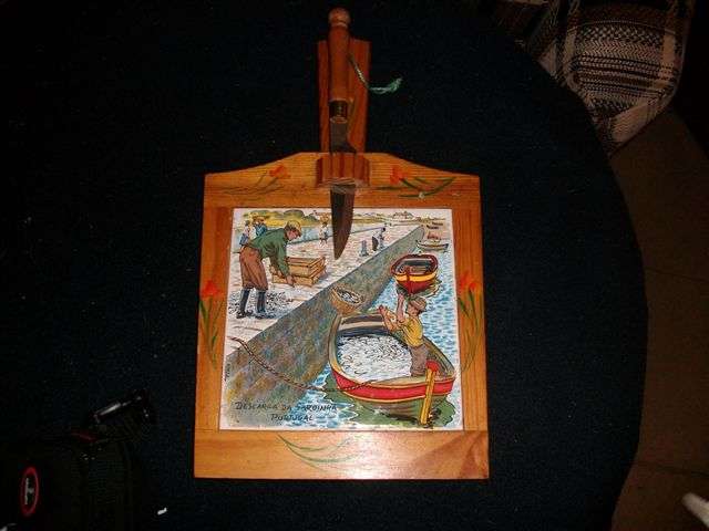 nice wooden and porcelain cheese board with knife
