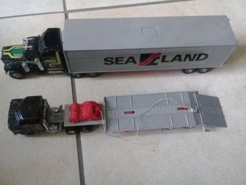 2 Articulated trucks, Sealand container truck and low loader