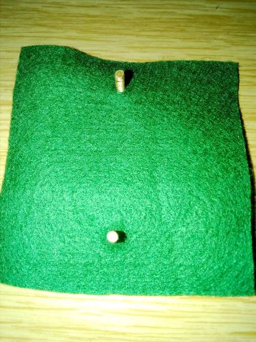 Natal Mounted Rifles WM beret badge with green backing