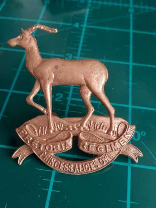 Pretoria Regiment brass Helmet and cap badge, Princess Alice`s Own