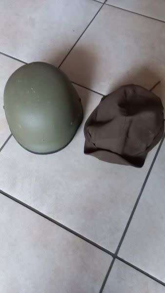 Helmet cover, small size, maybe Para. (Kevlar shown for size comparison.)