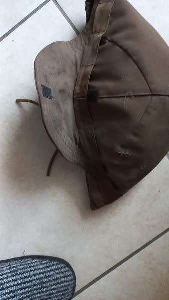 Helmet cover, small size, maybe Para. (Kevlar shown for size comparison.)