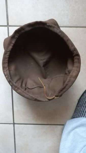 Helmet cover, small size, maybe Para. (Kevlar shown for size comparison.)