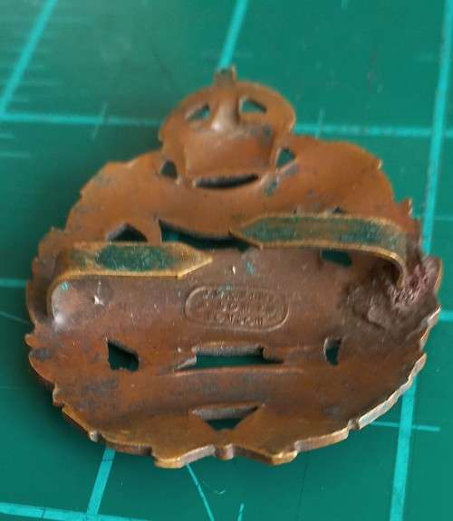 WWI British Tank Corps bronze Officer`s badge with blades, JR Gaunt London, scarce