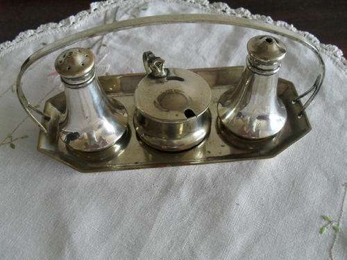 AN EPNS made in ENGLAND CRUET SET with its tray. Salt/Pepper/Mustard -wth blue inner