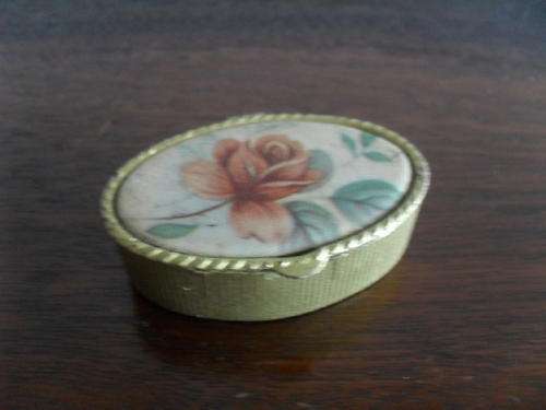 A MODERN METAL OVAL  PILL BOX