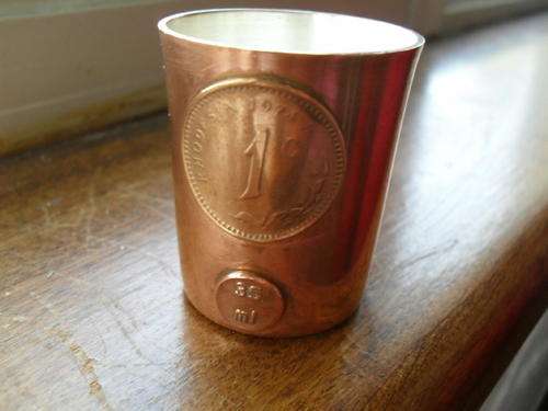 A copper  TOT-MEASURE  -with a lot of history attached to it