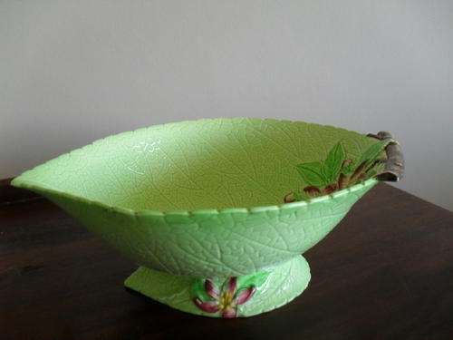 A LARGE CARLTONWARE FOOTED BOWL 1671