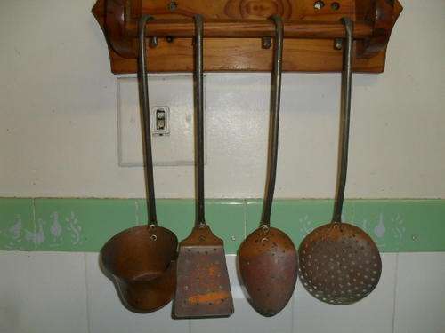 A SET OF FOUR  VINTAGE COPPER & BRASS UTENSILS -LIFTER, STRAINER, SOUP LADEL & BIG SPOON- 37cm long