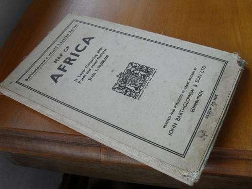 ANTIQUE MAP OF AFRICA -layer colouring with roads  -J. BARTHOLOMEW & SONS LTD. -CLOTH BOOK