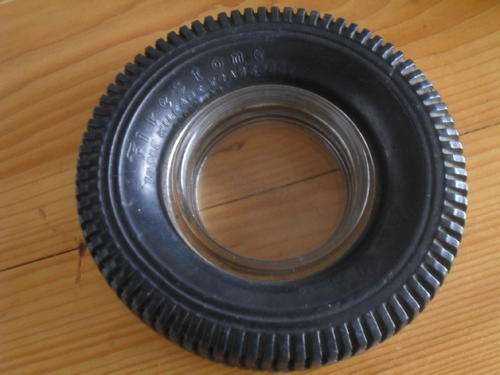 a VINTAGE FIRESTONE TYRE ASHTRAY