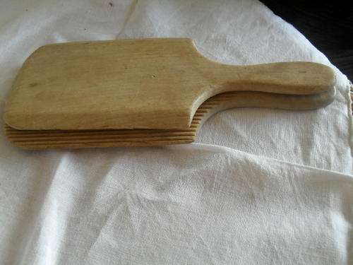 (42)  A PAIR OF WOODEN VINTAGE BUTTER PADDLES