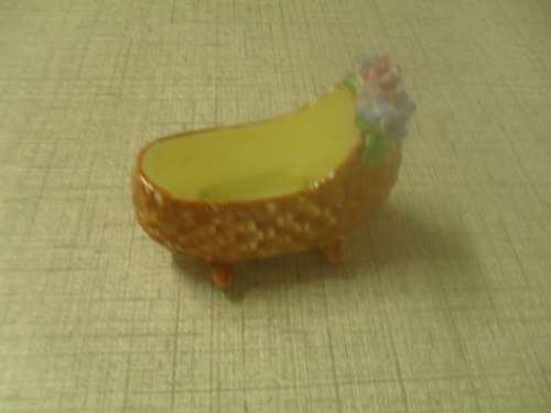 *# A VINTAGE BONE CHINA MINIATURE COALPORT CRADLE NO. AD1750