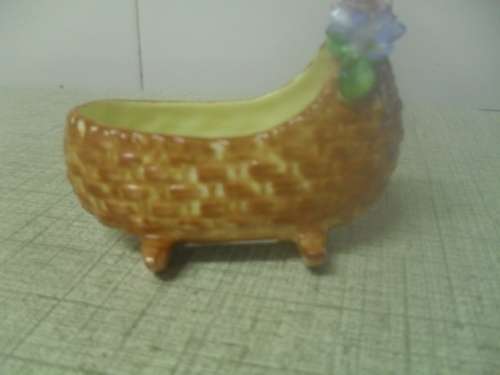 *# A VINTAGE BONE CHINA MINIATURE COALPORT CRADLE NO. AD1750