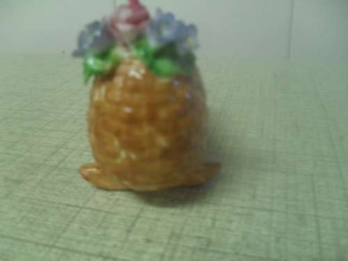 *# A VINTAGE BONE CHINA MINIATURE COALPORT CRADLE NO. AD1750