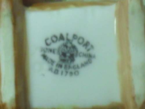 *# A VINTAGE BONE CHINA MINIATURE COALPORT CRADLE NO. AD1750
