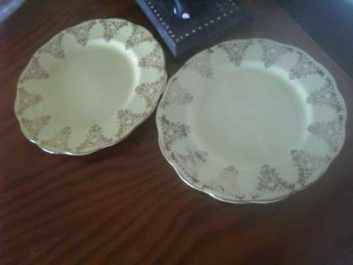 2 Royal Albert yellow with gold trim- 16cm across