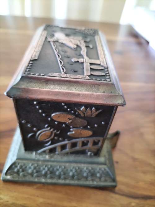 R30*## AN ANTIQUE METAL JAPANESE CIGARETTE DISPENSER - still dispenses