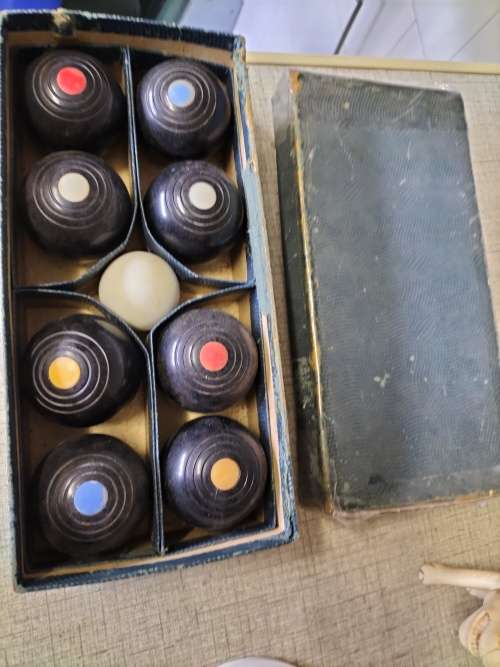 A VINTAGE  CARPET BOWLS SET